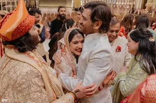 M S Dhoni photo: Radhika, may your radiant smile never fade! Anant, please continue to cherish an